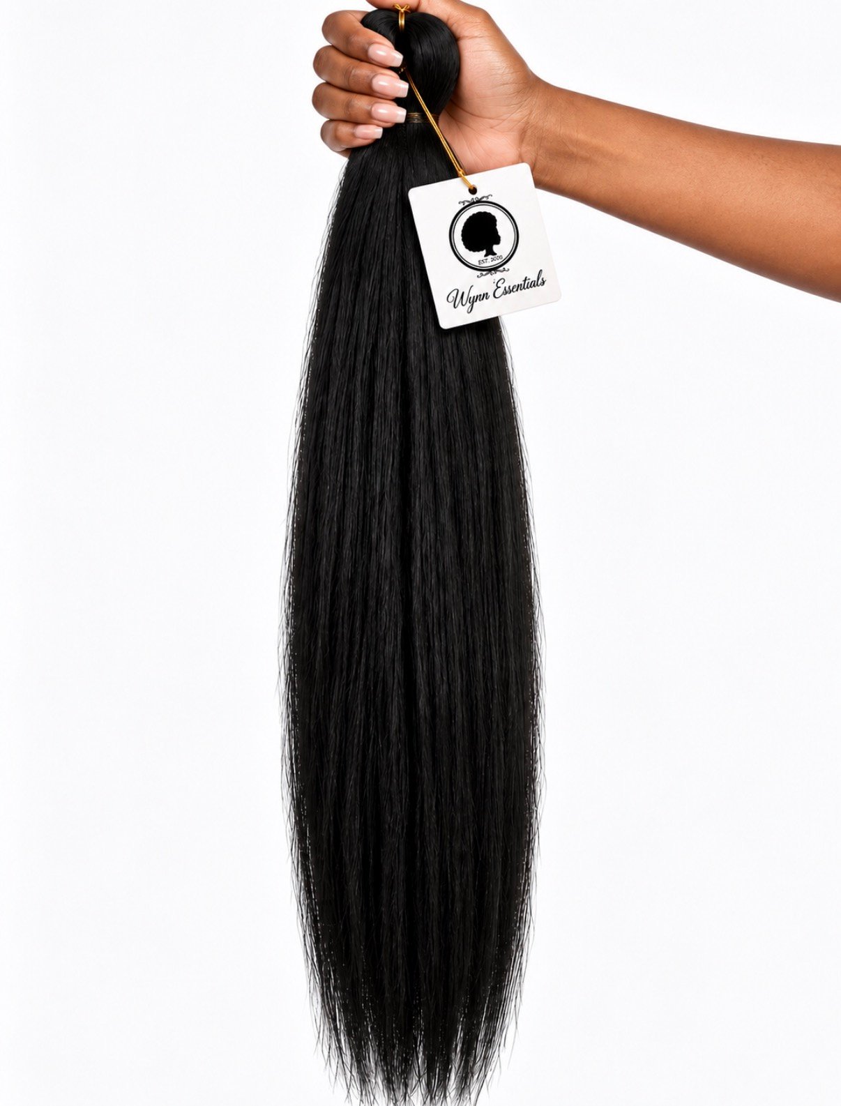 Hand holding a bundle of Wynn Essentials ACV-Treated Pre-Stretched Braiding Hair in #1 Jet Black