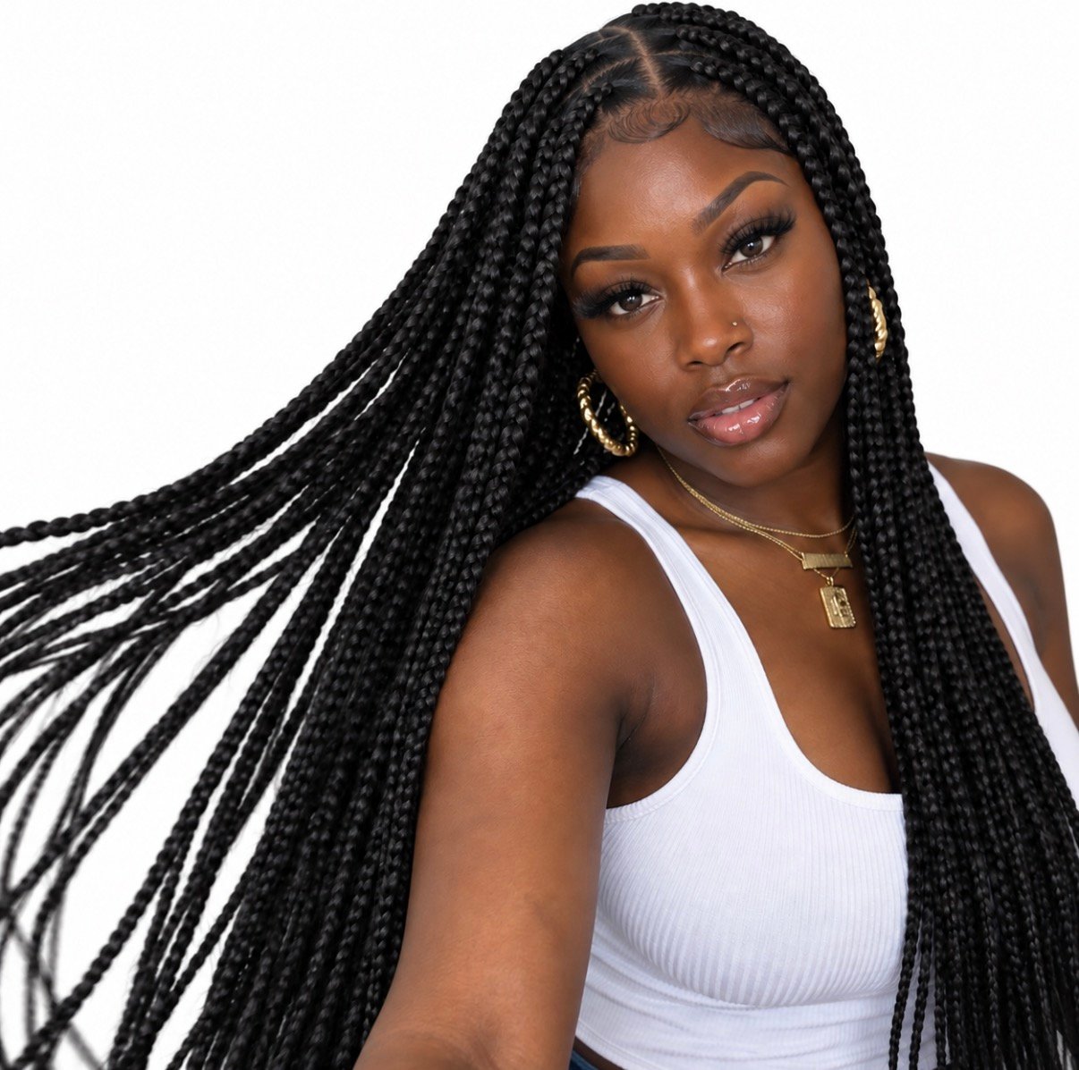 Model wearing knotless box braids styled with Wynn Essentials ACV-Treated Pre-Stretched Braiding Hair