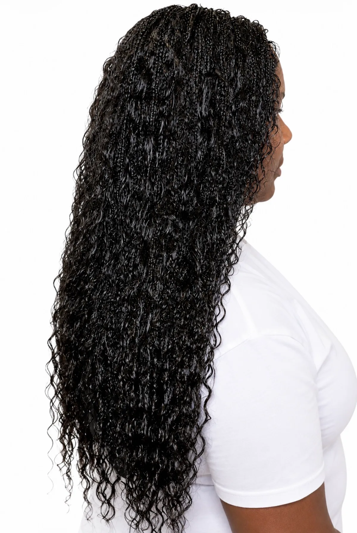 18-inch Spanish Curl human hair styled in long boho braids, side view