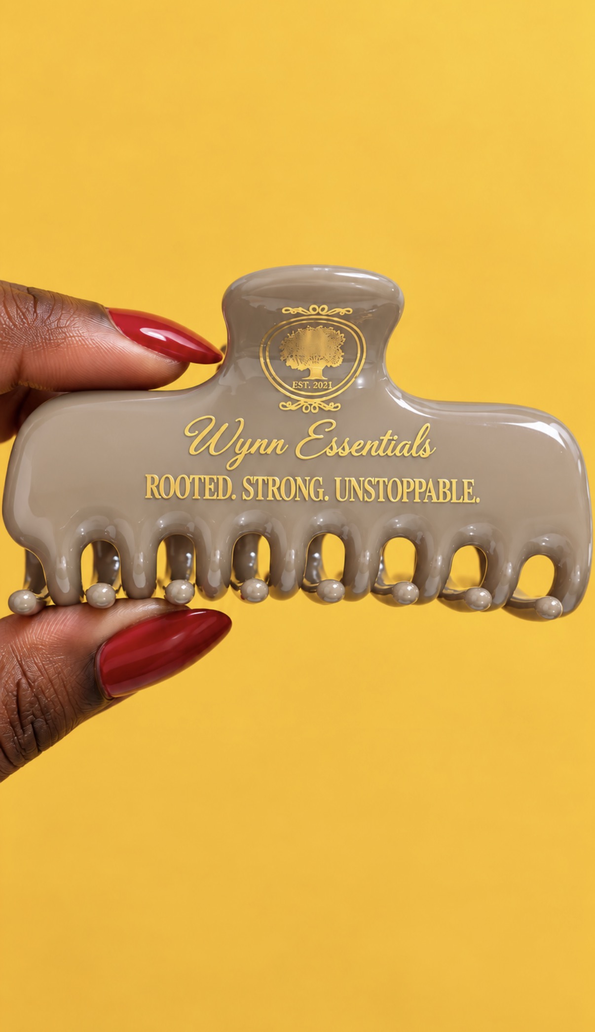 Essential Affirmation Clip in Griege, stamped Rooted. Strong. Unstoppable.