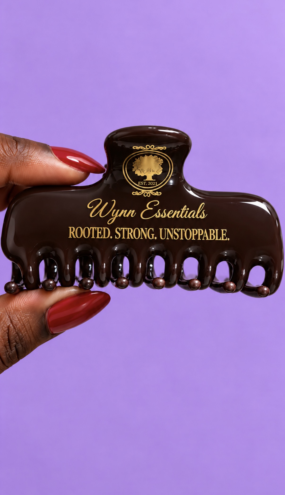 Essential Affirmation Clip in Mahogany, stamped Rooted. Strong. Unstoppable.