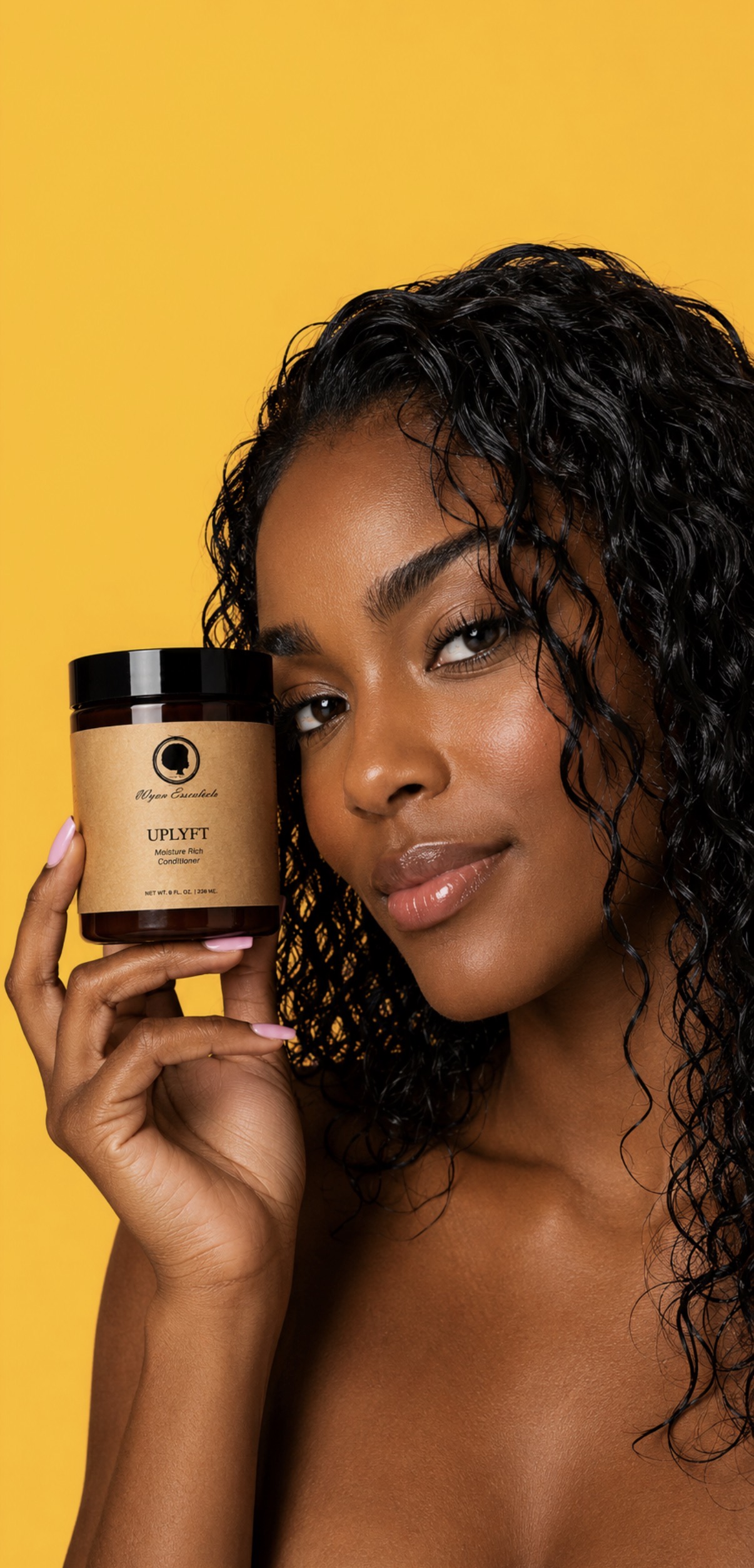 Model holding Uplyft Moisture Rich Conditioner